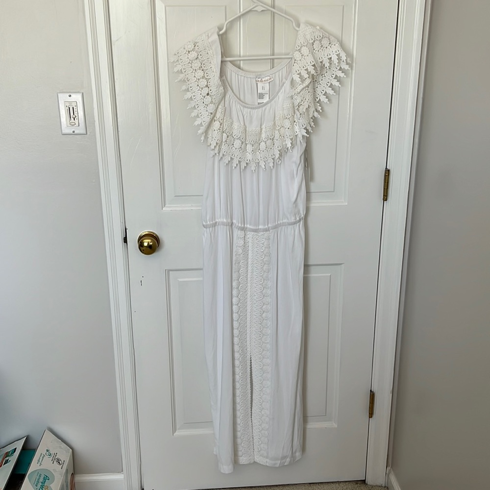 White off shoulder resort wear style dress.